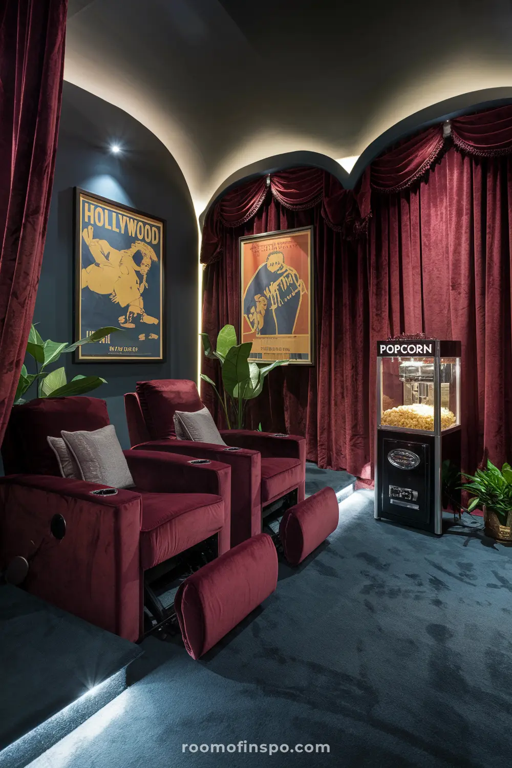 A classy home theater with vintage movie-inspired decor and a popcorn machine.