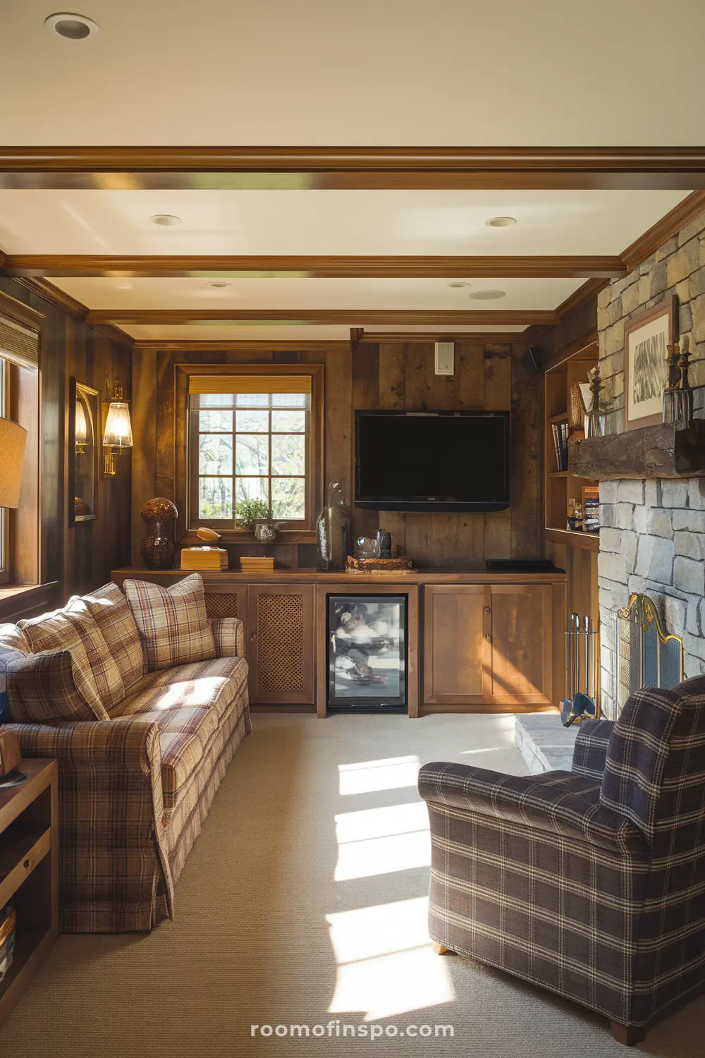 A cozy rustic cabin-themed man cave with wood, plaid accents, and a TV.