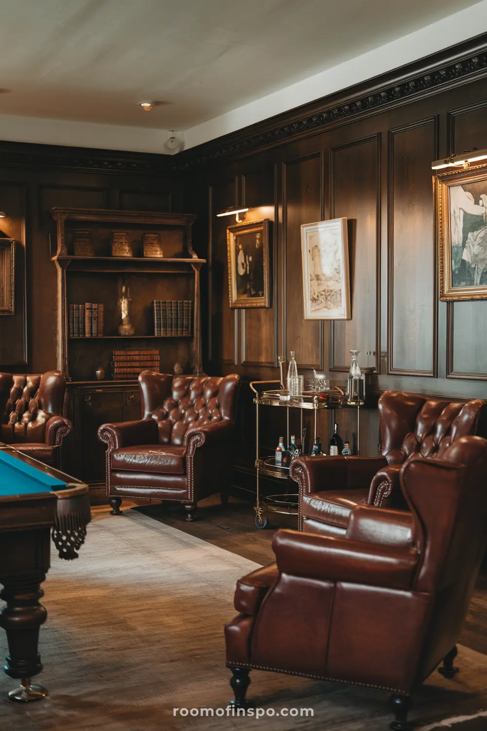 A refined vintage gentleman’s lounge with classic decor and a billiard table.