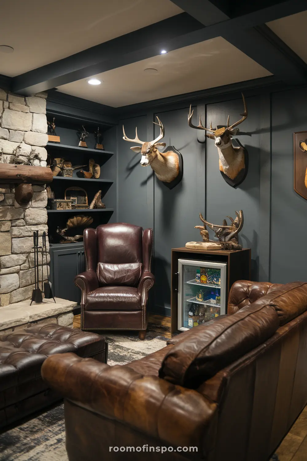 A classy hunting lodge man cave with a cozy rustic feel and refreshments.