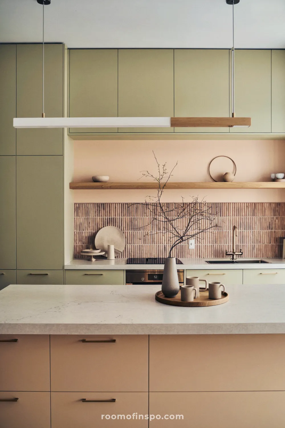 This bright, contemporary kitchen showcases neutral, earthy tones with a minimalist design and natural wood accents.