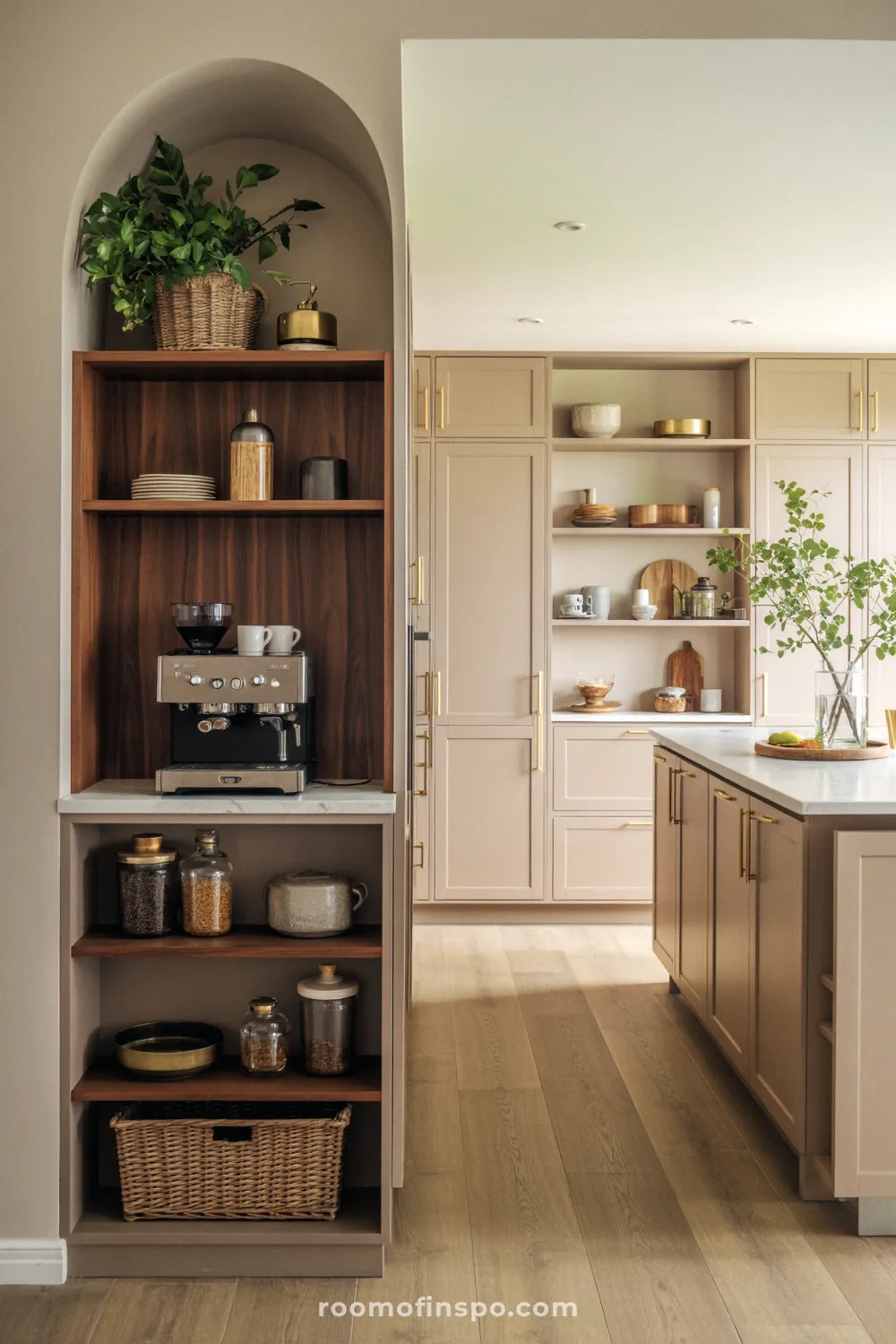 A trendy kitchen with an arched niche in the cabinetry, creating a stylish centerpiece for displaying décor and open shelving.