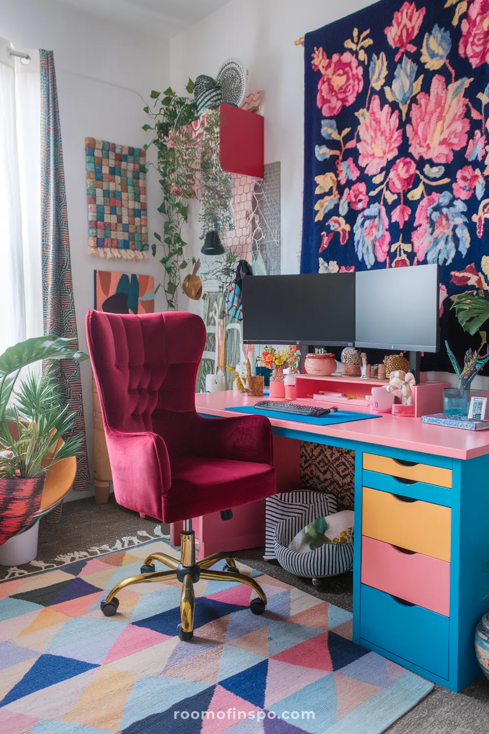 A maximalist home office with a statement velvet chair and monitor.