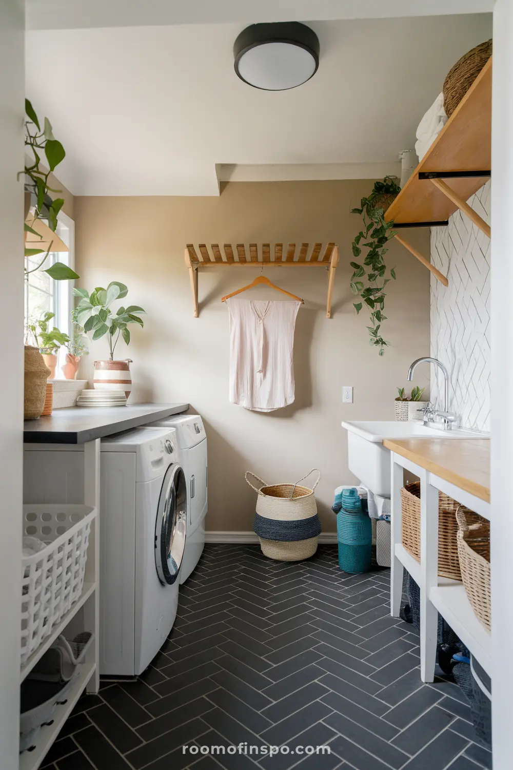 Modern laundry room with trendy tile designs.