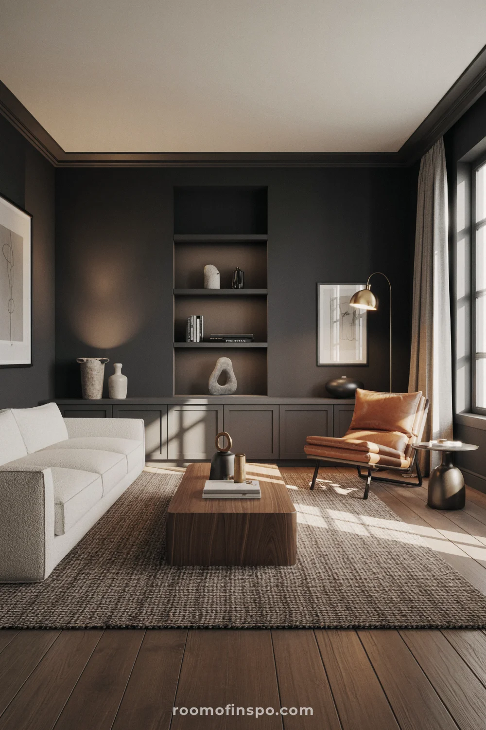 Deep espresso-brown living room with cream sofa, walnut coffee table, oak floors, and warm layered lighting.